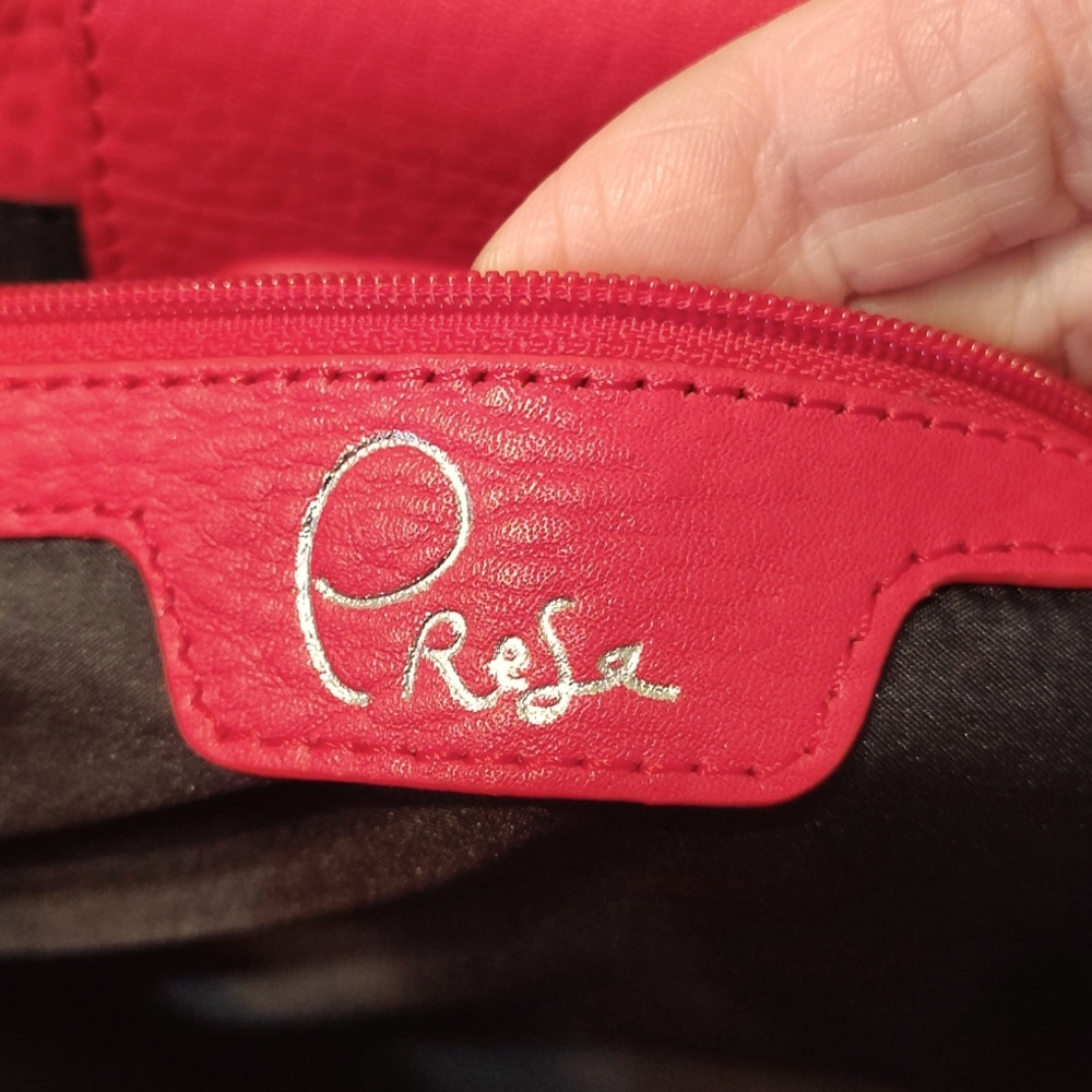 Presa 100% leather Red colored purse double handle plus shoulder strap